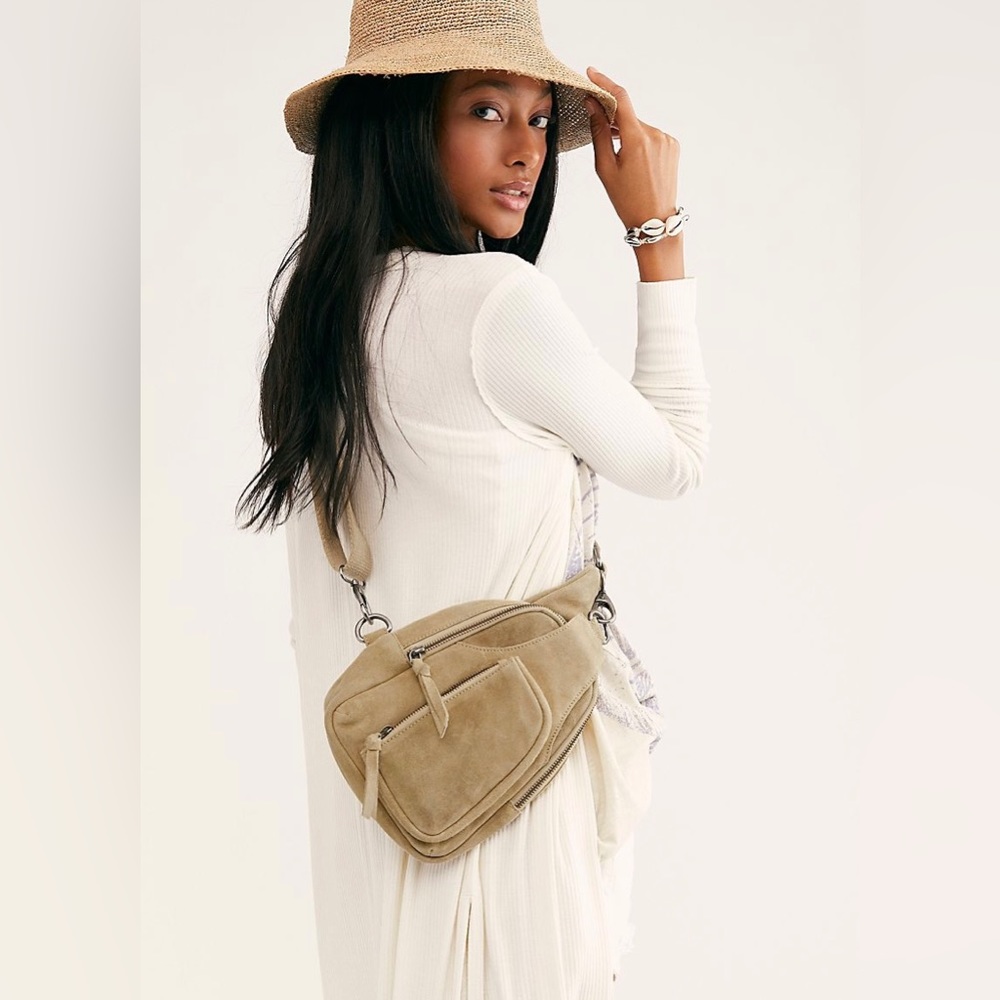 Free people suede cross body bag in beige. Brand new. Tag still on.